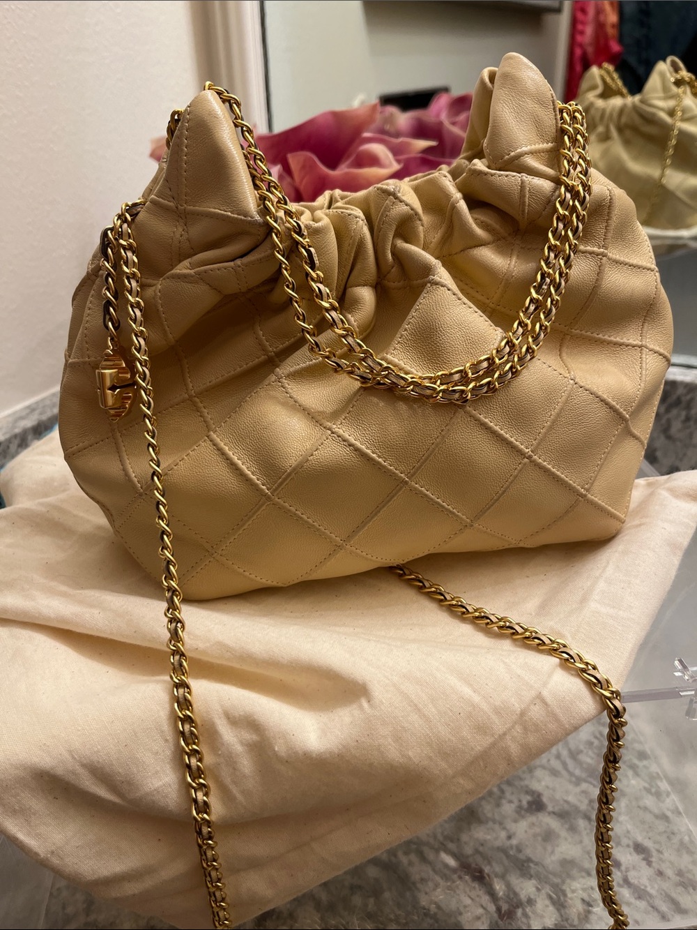 Tory Burch Quilted Drawstring Shoulder Bag in Beige with Gold Chain